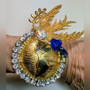 Wendy Gell Dove of peace and Earth on mesh bracelet